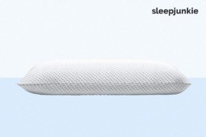 Amerisleep Comfort Classic Pillow with low-profile white textured cover on light blue background.
