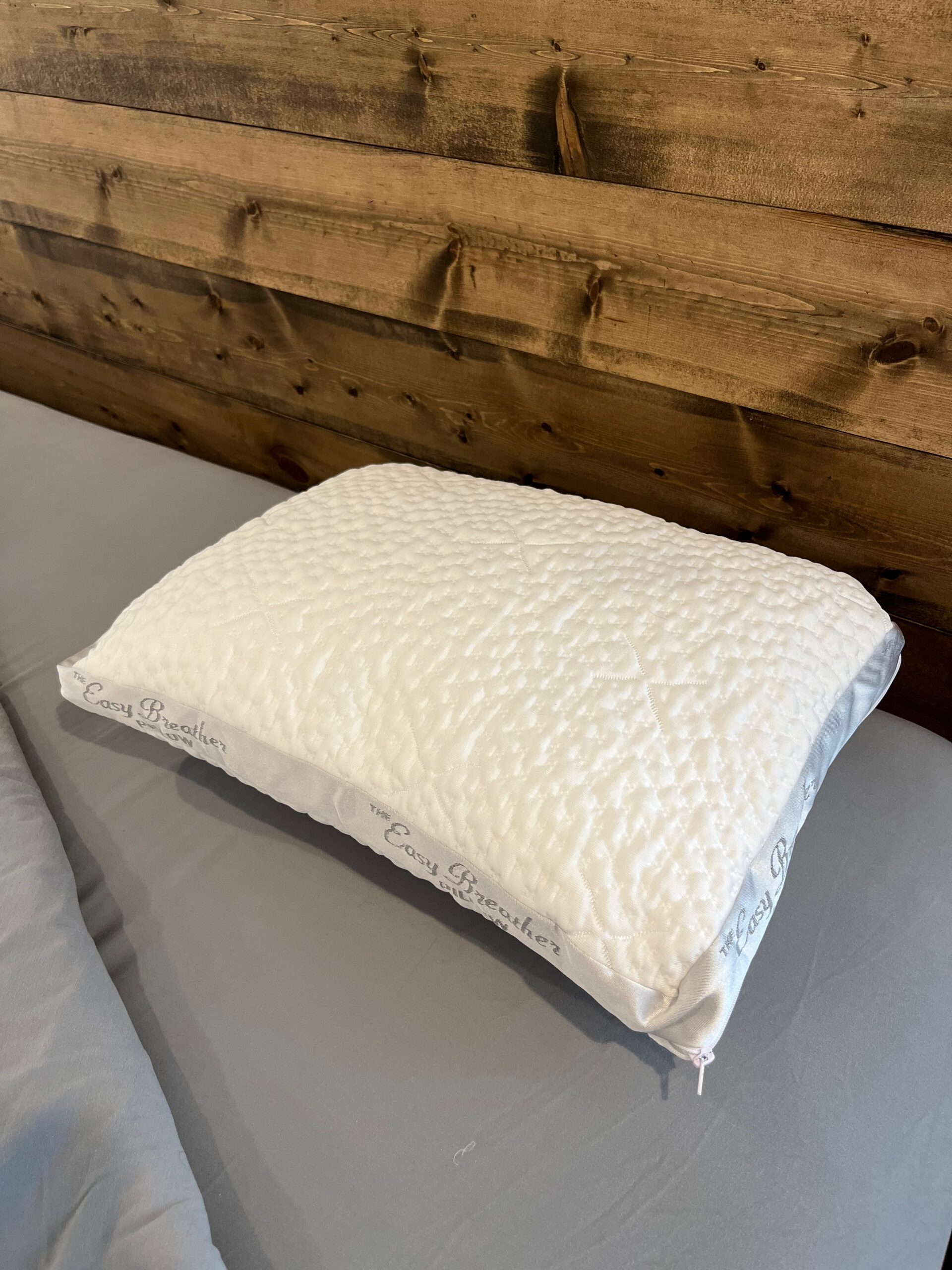 Nest Bedding Easy Breather Jr. Pillow, a junior sized pillow with a white knit cover.